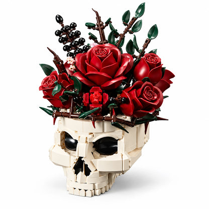 Ivory brick-built skull with red roses, green leaves and black berries